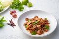 Popular Thai food.Spicy Grilled Pork Salad,grill pork with Charcoal and sliced mixed with lime juice,fish sauce,sugar and chilli Royalty Free Stock Photo