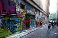 Popular tourist attraction of back street graffiti artwork on buildings in Hoiser Lane in Melbourne downtown, Victoria, Australia
