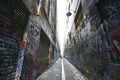 Popular tourist attraction of back street graffiti artwork on buildings in Union Lane in Melbourne downtown, Victoria, Australia