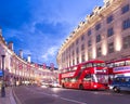 Popular tourist Regent street with flags union jack at night Royalty Free Stock Photo