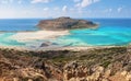 Popular touristic resort, coast of island Crete, Greece. Marvelous landscape of a rocky hill, Balos beach with fantastic sand. Royalty Free Stock Photo