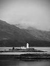 Popular view to Isle Ornsay Lighthouse. Rocky island south-east of Isle of Skye; Scotland