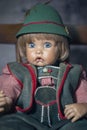 Porcelain antique doll in Bavarian clothes- close up Royalty Free Stock Photo