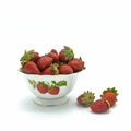 A porcelain bowl with fresh strawberries. Juicy ripe berries with green leaves. Royalty Free Stock Photo