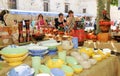 Porcelain bowls and objects at a stall at an outdoor pottery fair in Zamora.