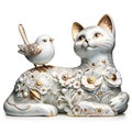 Porcelain ceramic figurine, cat, bird, floral patterns, gold. Glossy finish, decorative, whimsical, crafted, statuette