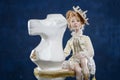 Porcelain clay blonde girl vintage dress chess knight Royalty Free Stock Photo