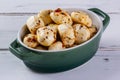 porcelain container with balls of seasoned buffalo mozzarella Royalty Free Stock Photo