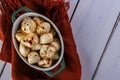 porcelain container with balls of seasoned buffalo mozzarella Royalty Free Stock Photo