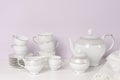 Porcelain or crockery tea and coffee set on white table. Royalty Free Stock Photo