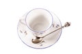 Porcelain cup with a saucer on a white background Royalty Free Stock Photo