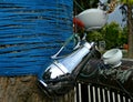 A porcelain cup, teapot and sugar bowl hangs on a yarn as part of an art installation Royalty Free Stock Photo