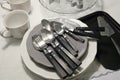 Porcelain Dishes, Plates, Coffee Cup and Silverware