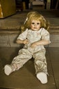 Porcelain Doll on stairs Royalty Free Stock Photo