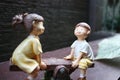 Porcelain Figurine Of Children On A See-Saw