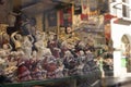 Porcelain figurines in dresses for flamenco dance in a shop window, souvenirs from Spain.