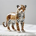 Porcelain figurines leopard. Sculptures made of porcelain and earthenware. Miniature figurines made of ceramics