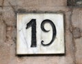 Porcelain house number nineteen