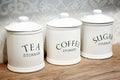 Porcelain jars for tea, sugar and coffee Royalty Free Stock Photo