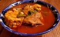 Mole de olla, typical Mexican soup with corncob, pork and chile Royalty Free Stock Photo