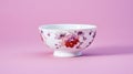 Porcelain tea cup with floral pattern on pink background. 3D rendering