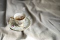 Porcelain tea pot and cup of hot tea on the table, antique traditional crockery set, high tea English afternoon tea Royalty Free Stock Photo