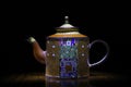 Porcelain teapot studio quality light black background