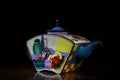 Porcelain teapot studio quality light black background