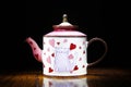 Porcelain teapot studio quality light black background Royalty Free Stock Photo
