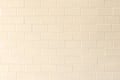 Porcelain tile texture patterned wall background light cream beige color Royalty Free Stock Photo