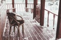 Porch of log cabine with snow Royalty Free Stock Photo