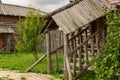 The porch of an old wooden village house in the summer.