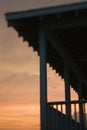 Porch silhouetted at sunset