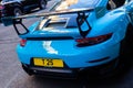 Bright blue Porche GT 2RS, 2018 model, Rear view of a car on the street