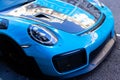 Bright blue Porche GT 2RS, 2018 model, Rear view of a car on the street