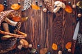 Porcini mushrooms in basket with berries and nuts on wooden table. Autumn harvest. Gathered fall crop. Space Royalty Free Stock Photo