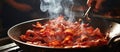 Pork bacon sizzling in a pan, releasing smoky aroma as it cooks Royalty Free Stock Photo