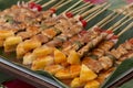 Pork barbecue sticks with tomato, pineapple Royalty Free Stock Photo