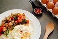 Pork basil leaves with fried egg on a plate of white rice and fr Royalty Free Stock Photo