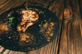 Pork bone steak on a board wooden background with honey kenzy, pepper