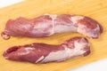 Pork boneless loin or tenderloin on a cutting board, close up Royalty Free Stock Photo
