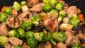 Pork with brussel sprout, carrot and eggplant Royalty Free Stock Photo