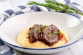 Pork Cheeks In Demiglas Sauce with mashed potatoes. Carrillada de cerdo in demi glace sauce