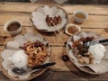 Pork and chiken rice mix called nasi campur, The traditional food from bali served in the table