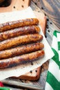 Pork chipolata. Close-up view of fried sausages. Meat dish