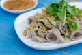 Pork chitterlings boil with spicy sauce