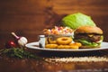 Pork chop burger with squid rings Royalty Free Stock Photo