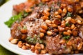 Pork chop with cedar nutlets Royalty Free Stock Photo