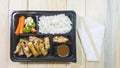 pork chop kurobuta steak Japanese style in bento set on plastic box