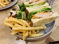 Pork chop sandwich, French fries, wild mushrooms and vegetables with hot chocolate Royalty Free Stock Photo